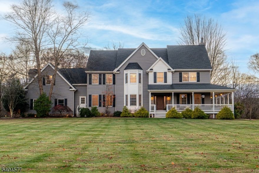 Graceful architecture and thoughtful updates come together at this elegant residence tucked away on a quiet cul-de-sac in one of Flemington's most desirable neighborhoods.A soaring two-story foyer with a rear staircase sets a refined first impression, leading into beautifully proportioned living and entertaining spaces designed for both comfort and style. At the heart of the home, the chef's kitchen is designed for everyday living and hosting alike, featuring quartz countertops, a center island, and stainless steel appliances, all flowing seamlessly into inviting gathering areas. A versatile bonus room above the garage offers endless possibilities as a guest suite, au pair quarters, or additional living space.Upstairs, the primary suite is a true retreat with a fireplace and two walk-in closets, while the remaining bedrooms are generously sized and thoughtfully laid out. Outdoors, a wrap-around porch transitions to a deck and a heated in-ground pool, creating a private backyard oasis ideal for summer entertaining and relaxed outdoor living. Situated within the sought-after Blue Ribbon Hunterdon Central School District and just minutes from Hunterdon Medical Center, historic Flemington and Clinton, major commuter routes, parks, shopping, and dining, this exceptional home offers timeless appeal, modern comfort, and an enviable lifestyle inside and out.