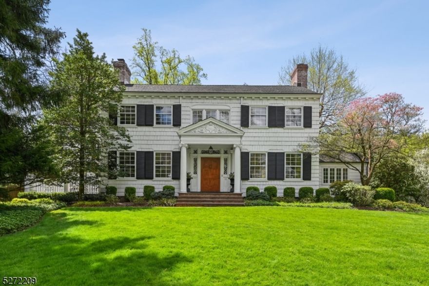 Welcome to this magnificent center hall Colonial that is totally renovated to perfection and ideally located on a totally level .91 acre south facing property so kitchen & family room get great natural light, w/ plenty of room for a pool on a blissfully quiet street in the heart of Old Short Hills, walking distance to the Short Hills Train Station (0.5 miles), Glenwood Elementary School (0.6 miles) & Arboretum. Owner did a gorgeous addition & renovation of the stunning gourmet eat-in kitchen, which is totally open to the family room w/ great natural light from 2 exposures, w/ top of the line appliances, center island , designer cabinetry  & easy access to bluestone patio, gorgeous Koi pond visible from kitchen & totally level property. There is an office w/ custom built-ins & bookcases, a living room & dining room each w/ stately fireplaces, a mudroom w/ easy first floor access to attached 2-car garage, & backstairs for added privacy. The 2nd level has a luxurious primary bedroom suite w/ sitting room leading to huge primary bedroom, custom WIC & new spa-like bath w/ radiant heated floors, steam shower & soaking tub. 3 more large bedrooms & 3 more full baths complete the 2nd level. Beautifully finished lower level w/ rec room w/ wet bar, & exercise room. Has whole house generator, new kitchen, new primary bath, newer systems (2 of 3 AC systems & furnace new in 2023). All this on 0.91 acres of rare  to find totally level, beautifully landscaped property in an ideal location!