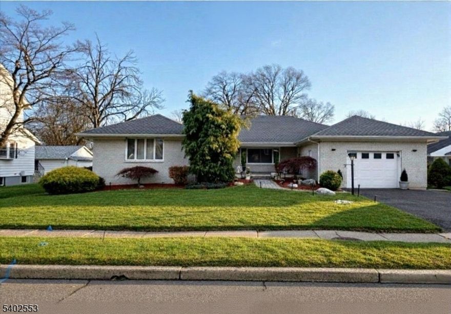 An exceptional opportunity in the heart of Union, this beautifully updated multifamily-style residence offers versatility, space, and true move-in-ready appeal. The main living level features three generously sized bedrooms, two full bathrooms, and approximately 2,400 square feet of bright, open living space designed for today's modern lifestyle. Sun-filled rooms and a well-balanced layout create a welcoming atmosphere ideal for both everyday living and entertaining. What truly sets this home apart is the fully finished basement, thoughtfully designed as a separate living area with its own private entrance, perfect for guests, or strong income potential. Additional highlights include a four-car off-street driveway with garage parking, expansive open-concept living areas, and a spacious 9,243-square-foot lot that enhances both privacy and usability. Conveniently located near major highways, NYC transportation, shopping, and dining, this property delivers the perfect blend of comfort, flexibility, and location.