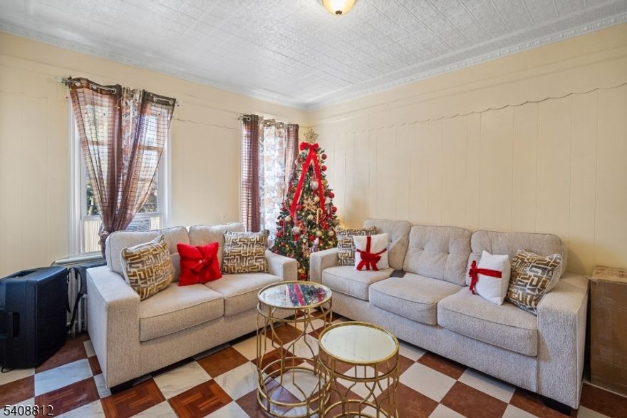 Great opportunity for investors or first time buyers.  This conveniently located 4 bedroom, 3 bath home features a finished basement and 1 parking spot.   Close to shopping, transportation and local amenities.  Property sold as is, no repairs or credits.  Equipped with solar panels offering potential energy savings. Best and Highest due Tuesday 2/24 5pm.