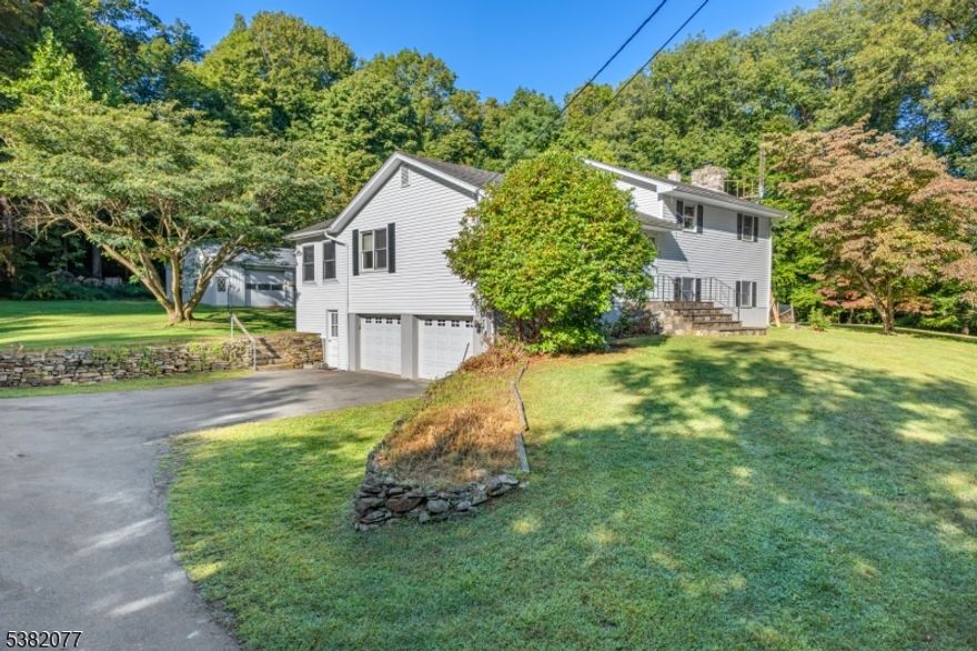 "SPACIOUS POLE BARN (approx. 50'x30')" Set on 4 PRIVATE ACRES along the Warwick border (on the legendary Barrett Rd), this rare find offers the perfect blend of space and privacy. Surrounded by mature hardwoods, the property offers a peaceful and secluded setting with an expansive backyard, ideal for entertaining, relaxing, or simply enjoying the fresh country air. Inside, the home is filled with natural light and timeless charm. Whether you embrace its mid-century character or update with your own style, the possibilities are endless. Features include central air, hardwood floors, a fireplace with a fieldstone hearth and chimney, wood boiler as an optional heat source, a sunlit living room with picture window, formal dining room, heated back porch, abundant storage and closets, security system, plus an oversized two-car garage with an additional workshop perfect for hobbies or extra storage. An additional parcel in Warwick is included in the sale, making this opportunity even more unique. Conveniently located minutes from downtown Warwick, NY, you'll enjoy easy access to both Warwick, NY and Vernon, NJ attractions: Mountain Creek ski slopes, Crystal Springs Resort, golf courses, hiking, biking, fishing, horseback riding, orchards, wineries, lakes, and more. Discover the best of Sussex County living where nature and community come together.  HOME IS NOT PART OF THE HIGHLAND LAKES COMMUNITY, ALTHOUGH THE POSTAL ADDRESS STATES HIGHLAND LAKES. IN-GROUND POOL IS AS IS CONDITION.