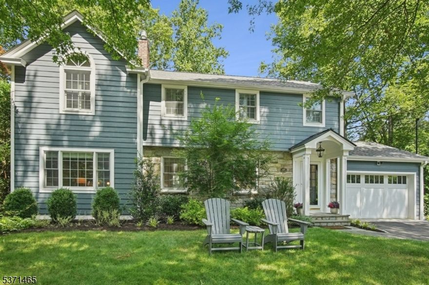 Highly sought after Memorial Field/Brayton School neighborhood. MOVE-IN READY and remodeled to perfection. Major renovation completed in 2023/2024 featuring a bright modern kitchen, custom cabinetry, quartz countertops, high end stainless steel appliances, large center island (ample seating) and dry bar w/wine refrigerator. Open concept kitchen/dining/great rm with adjoining family room and direct access out to deck and backyard. Renovated primary bath (his/her separate vanity featuring quartz countertops) and spa shower. Additional 3 bedrooms and renovated full bath complete second level. Finished basement rec rm and ample storage with full size laundry area (washer and dryer included.) Exterior NEW features include: expanded heated garage, Hardiplank siding, Andersen thermal windows, roof, gutters, boiler, multi zone sprinkler system and professionally landscaped front and back yards w/bonus side yard in front. So many additional features. A+ LOCATION within a block from Memorial Field (park, playground and sports fields), Brayton school and approx one mile to town center, shopping, restaurants, YMCA , NJ Transit (train and Lakeland bus)