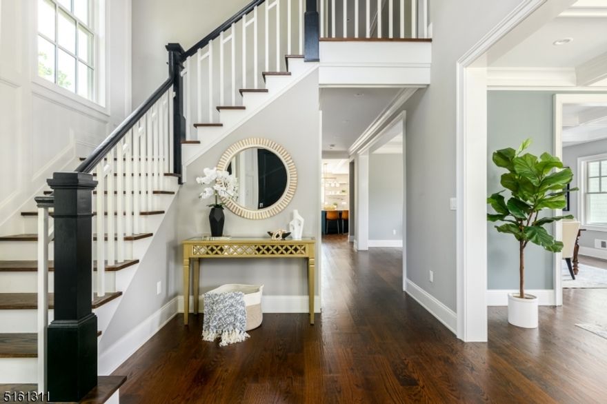 THE SEARCH STOPS HERE! Meticulous construction by renowned Short Hills Builder Singer Properties. Thoughtfully designed and executed to the highest standards. Be greeted by your charming covered porch, and welcomed by a grand entrance foyer that sets the stage for entertaining and making memories for years to come. With high ceilings and generous room sizes throughout, your expectations will be exceeded at every turn. The designer Chef's kitchen is complete with Thermador professional appliances, custom cabinetry and molding, and quartzite slab with floating shelves that are sure to be a conversation piece. The magic continues in the oversized family room, drenched in sunlight with gas fireplace and custom mouldings. The first floor is complete with a walk in pantry and office. The second floor boasts 4 generous sized bedrooms including a master suite that rivals the best. Continue to the basement with a playroom, mudroom, nanny's quarters, and TV viewing area. Gracious living continues outdoors with the bluestone patio, grill and separate TWO STORY, CLIMATE CONTROLLED ARTIST STUDIO - ready to give you WFH options, a cabana, or a playspace for all ages!  All of this and only a short distance from the Short Hills train station, Racquets Club, Short Hills Village, Arboritum, Schools, and Downtown Millburn.