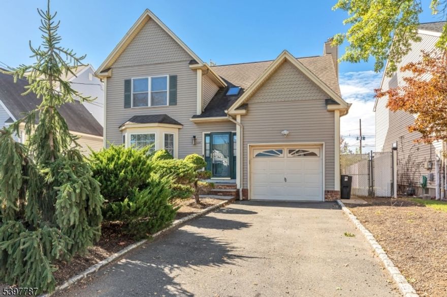 Welcome to this elegant Colonial residence, where timeless charm meets modern comfort. With 4 bedrooms, 3 full baths, and 1 half bath, this stately home offers a harmonious blend of classic architecture and contemporary livability perfectly suited for today's lifestyle. Step through the formal foyer and into a sunlit flow of gracious living spaces. The expansive living room and formal dining room set the stage for memorable gatherings, while the modern, open kitchen seamlessly connects to a warm and inviting family room. Here, a wood-burning fireplace anchors the space, creating a cozy centerpiece for both quiet evenings and lively company. Upstairs, you'll find four beautifully appointed bedrooms, including a serene primary suite enhanced with generous closets and a private, spa-like bath. The fully finished lower level extends the home's versatility ideal for a recreation room, media lounge, fitness area, or creative studio complete with its own full bath for added convenience.  Thoughtful updates, modern HVAC, and high-quality finishes reflect care and attention throughout, offering both comfort and peace of mind. Nestled in the desirable borough of Kenilworth, NJ, this home enjoys effortless access to schools, parks, shopping, and major routes including Route 22 and the Garden State Parkway. Blending small-town charm with exceptional convenience, this location is as appealing as the home itself.