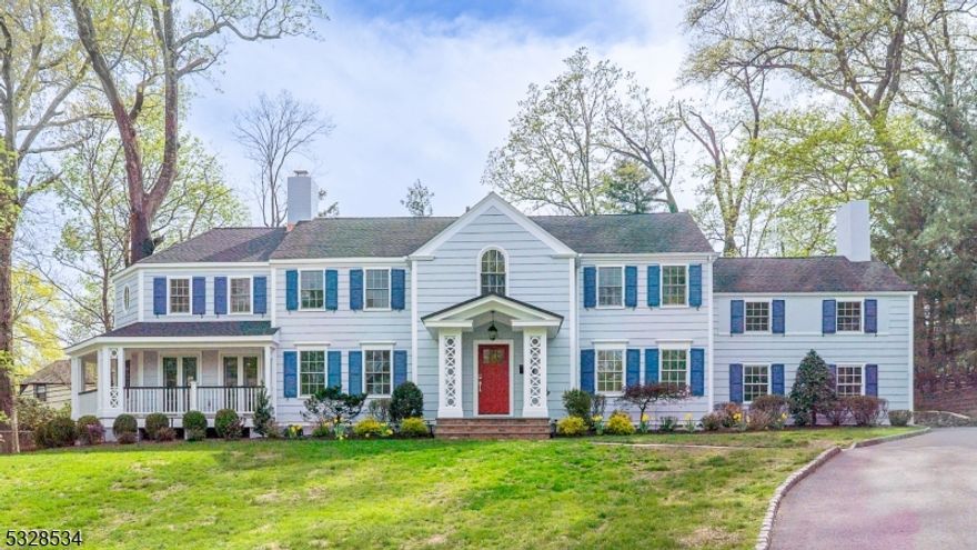 Majestically perched on one of town's most sought-after streets, this spectacular Center Hall Colonial blends the best of old & new. Completely renovated from top to bottom, every inch of this home has been professionally designed & meticulously finished...no detail has been missed! Set deep beyond the lush front lawn, the front porch is just the beginning of this spectacular home. The grand entrance Foyer opens to the expansive Living Rm w/ WBFP accented by custom stone hearth & shiplap wall. A sun-drenched haven, the hexagonal Family Rm offers solid wood panel walls, large windows & four sets of French doors providing access to each side of the wrap-around porch. Formal Dining Rm w/ bayed wall of large windows flows to the dreamy Chef's Kitchen featuring furniture quality cabinets, quartz counters, premium SS appliances incl a 6 burner Dacor stove, Sub-Zero, double farm sink & huge center island, providing casual entertaining & dining space. Mud Rm w/ door to 2 Car Gar & Powder Rm. Sweeping staircase leads to 6 generously sized Bedrooms & 3 full Baths on 2nd fl, including two BRs & Full Bath that enjoy extra privacy as needed via a back staircase, ideal for guests or home office. Primary suite w/ oversized luxurious bath w/ double entry glass enclosed shower, soaking tub & water closet, 3 WICs. Finished lower-level Rec Rm, Exercise, Laundry, Powder Rm & storage. Double rear patios & fire pit anchor the private, parklike rear yard. 1/2 mile to SO Village & NYC direct trains.