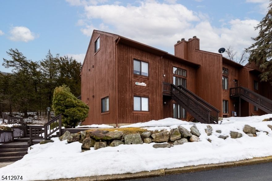 Highly desired, single level, ground floor end unit! Spacious, open floor plan with large dining area, wood floors, fireplace, and oversized windows that look out to a wooded and private border. Large windows create a sunny and warm space full of natural light. Unit includes two spacious bedrooms, full bathroom and laundry, EVERYTHING on one level. Convenient and easy access to front door entry from the parking lot. Large back patio has a wooded area that is conducive to privacy and birdwatching. These are tough to find units, and it will not last. This much loved home is ready for your updates, quick closing possible! Enjoy all that Vernon has to offer, including golfing, skiing, mountain biking, fishing, swimming, boating, and relaxing at the spa. Explore the Appalachian Trail, visit state parks, sample local wineries, farmers markets, and more!