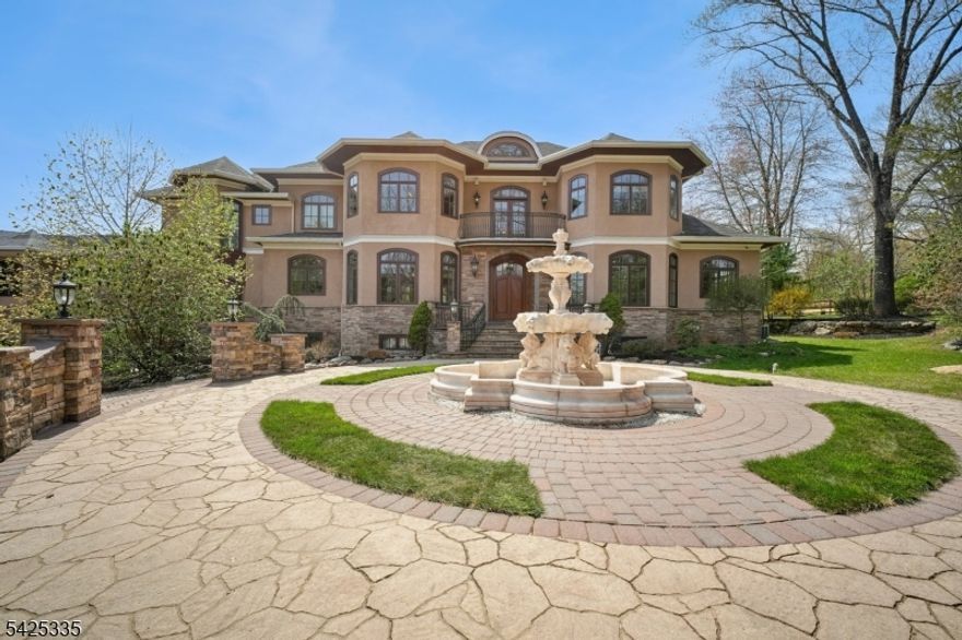 Stunning Custom Home.  6 Bedrooms, 7 Bathrooms and a complete In-law attached Apartment.  Picturesque 6.7 acres, 6 car Garage and Private Pond. Brazilian Cherry Floors. The Chef's kitchen has Custom Cabinets, Sub-Zero Refrigerator and Freezer. JennAir Appliances include: 4 Cooling Drawers, 2 D/W, 2 Convection Ovens, Induction Stovetop and Microwave. Prep Island, Butlers Pantry and 3 Copper Sinks. Kitchen is open to the Great Room and DR. Great Room w/FP Leads to Bluestone Patio. LR Has Patio Access. Stunning 3 Story Grand Staircase. Primary BR w/Fireplace, 2 Dressing Rooms w/California Closet Systems, Bath w/Shower, sauna, 2 Vanities and Private Patio.  Plus Attached Nursery and Powder Room leads to Main Floor Office. Laundry/Pantry off Kitchen. Private Apt connects with Private Hallway. Large Living Area, Full Bath and BR. Private Entrance and Garage Access. 2nd Floor has Jack n' Jill BR w/FB.  Additional En-suite w/FB, 2 BR with Full Hall Bath and Laundry Room. 3rd Floor Loft has Murphy Bed. Basement Level is a Full Walkout from the Rec Room. Rec Room has a Full Bar, Fireplace, Wine Cellar and Full Bath. There is a Gym and a Large Theatre seats 10+. Mudroom with 6 Custom Cubicles Leads to Another 3 Car Garage.  7 Minutes To The Train, Close to Town and Lakes. Realtor.com rated Denville, NJ the best community friendly suburb in the U.S. in 2021.