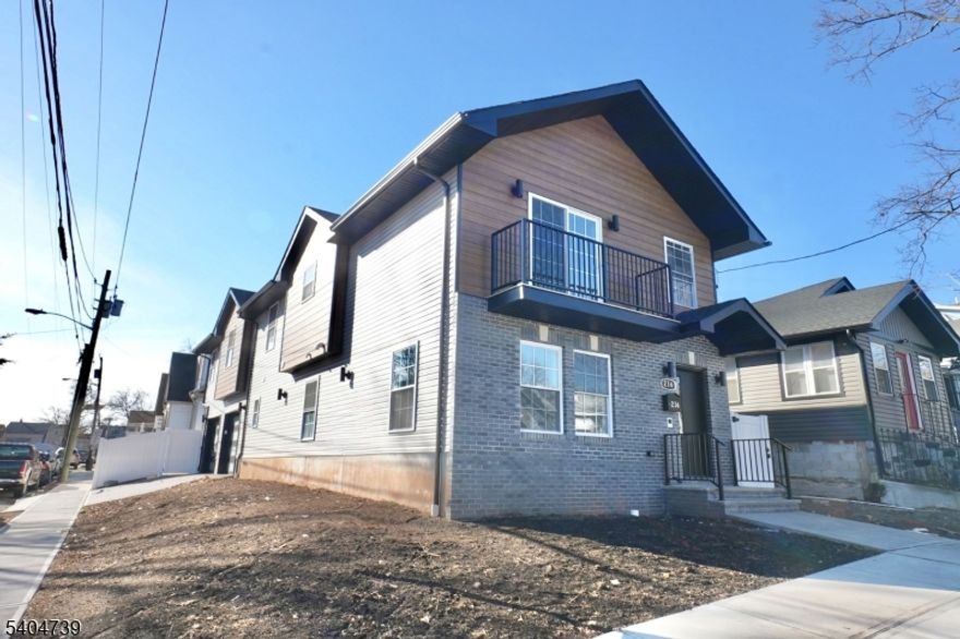 Welcome to this stunning brand-new construction single-family home located on a desirable corner property at 236 Keer Ave in Newark. This thoughtfully designed residence offers 4 spacious bedrooms and 3 full bathrooms, combining modern style with everyday functionality. The ground level features a versatile family room?perfect for relaxing, entertaining, or creating a home office or play space. Upstairs, enjoy gleaming hardwood floors, an open and inviting layout, and abundant natural light throughout. The living room opens to a private balcony, ideal for morning coffee or evening relaxation. The modern kitchen is beautifully finished with sleek cabinetry, contemporary surfaces, and stylish light fixtures, making it perfect for both daily living and hosting guests. The primary bedroom serves as a private retreat, complete with a walk-in closet and a full en-suite bathroom. All bathrooms feature clean, modern finishes. Additional highlights include a dedicated laundry room, a brand-new fenced-in yard offering privacy and outdoor enjoyment, a two-car garage, and a seamless layout designed for comfort and flow. Conveniently located near major highways, public transportation, shopping, and local amenities, this move-in-ready home is a must-see. Schedule your private showing today and experience all this exceptional new construction has to offer.