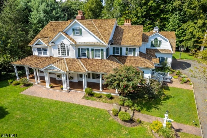 Spectacular 6 Bedrooms, 6 Full and 2 Half Bath Custom-built (2005) Colonial in the Hill section of Madison! Remarkable craftsmanship at every turn built by renowned builder Steve McCann! Quiet cul-de-sac, gorgeous curb appeal with wraparound mahogany Front Porch, and .75 acres of outstanding property with amazing Rear Patio with built in BBQ and outdoor fireplace. High ceilings and fantastic flow for everyday living and entertaining. Dream Chef's Kitchen with quartz, island, Breakfast Bar and stunning Breakfast Area. Magnificent Living Room with stately fireplace, custom built-ins and outstanding outdoor views. 1st Level Office. Elegant Dining Room. Family Room with fireplace off Kitchen. 1st level Mud Room, Laundry and 3 Car Garage. 1st Level Guest Room and Full Bath. Gracious Living and Dining Rooms. Outstanding Primary Suite with Sitting Room with fireplace, Dressing Room with built in dressers, 2 custom Walk In Closets and luxurious bath. Enormous Lower Level with 2 Recreation areas, Game/Exercise Areas, Bonus Room with full bath, storage, and Half Bath. With its superior design, vicinity to New York City, proximity to Midtown Direct train, sought after schools and convenience to fantastic downtown Chatham and Madison, 41 West Lane is exceptional in every way.