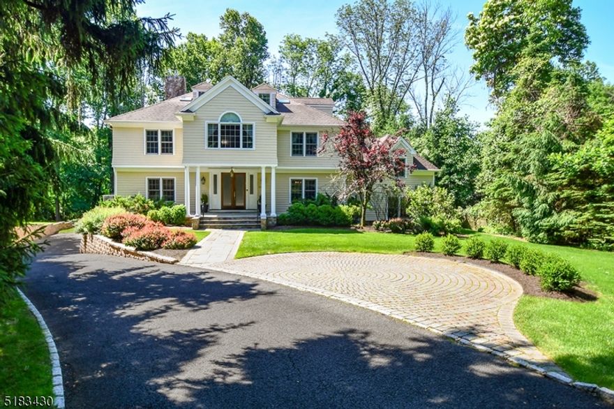 Commanding colonial on 1.08 acre serene private property in the Franklin school district.   Exceptional space and fantastic floor plan and flow for entertaining and everyday living!  6000+ square feet with grand spaces, 7 bedrooms, 2 family rooms, billiard room, home office, front and rear staircases, 3 car attached garage.  Beautiful property with deck and patio as well as large play yard and wooded rear views.  Custom built in 2003 and well maintained.  Move in and enjoy a fabulous Summit lifestyle!