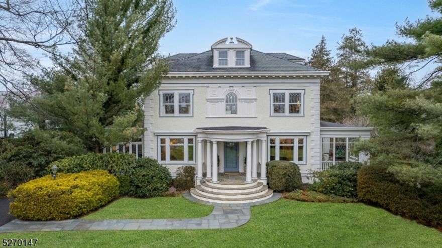 A rare opportunity to own one of Chatham's most coveted homes, this architectural gem is  majestically situated among Chatham's timeless original mansions. Boasting just under an acre of spectacular property with endless views, this beautifully appointed home offers the perfect balance of fine architectural details, classic elegance and amenities for today's living! The gracious foyer with a sweeping staircase is flanked by an elegant living room and formal dining room for sophisticated entertaining. The front to back living room is enhanced by high ceilings and Juliet doors framing the marble gas fireplace. The adjacent  study surrounded by transom windows allows the sunlight to spill in!  The handsome butler's pantry offers lighted cherry cabinetry, wet bar and wine fridge. Step into the inviting kitchen featuring custom cabinetry with granite tops, center island and high end appliances opening to the family room warmed with radiant heat floors is truly the heart of the home! The second floor is host to 4 bedrooms including the serene primary suite with primary bath with marble flooring and marble topped vanity,three other bedrooms and a renovated hall bath that serves them. Third floor allows for 2  spacious bedrooms and an updated full bath. The spacious lower level recreation room boasting custom built-ins, wainscoting, a wet bar and an exercise area is ideal for added leisure.  With an Idyllic real yard, this truly special home will captivate the most discerning buyer!