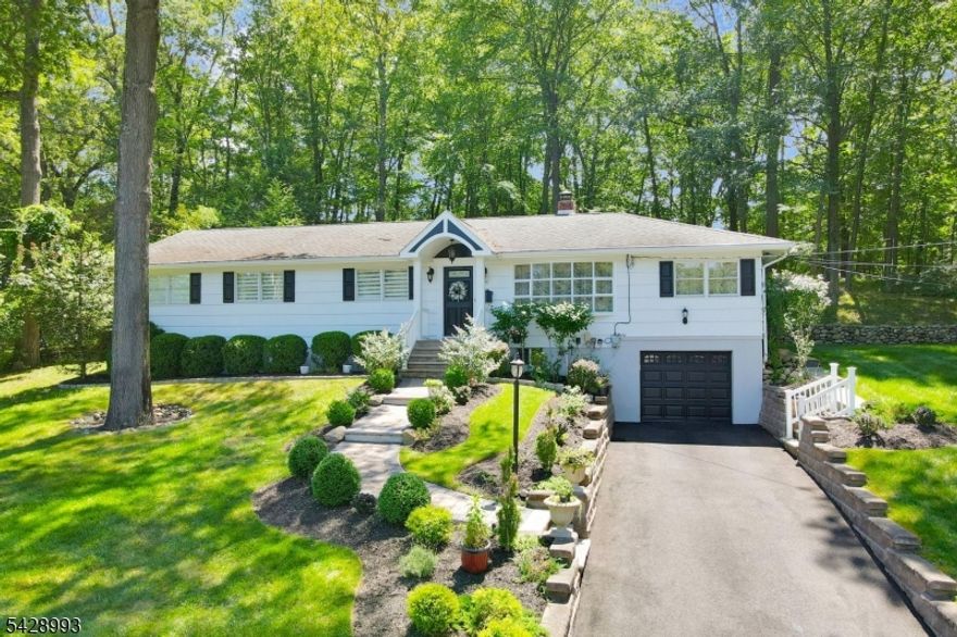 A true gem expanded ranch in Oakland's Dogwood section that offers style, comfort, and thoughtful updates! Impeccably maintained 3BR/2FBA home features hdwd flrs,open concept LR and formal din area, and a striking L-shaped fireplace that adds warmth and character. A well appointed EIK has ss appls and granite counters. Serene primary suite is a private retreat w/vaulted ceiling, skylights, French doors leading to a secluded deck,beautifully updated spa like bath with jetted tub and stall shower, and an impressive walk in closet. Two additional BRs complete main level. Fully fin lower level expands liv space w/generous fam rm, guest BR, FBA, OFC, lndry area, and ample storage, along w/direct access to the one car att gar. Set on a picturesque half-acre of professionally landscaped grounds, this property offers exceptional privacy w/mature plantings,sprinkler sys, and expansive decking. Ideally located near Oakland?s top rated schools, parks, and recreational amenities, w/ convenient access to NYC transp and major hwys, this home is a rare opportunity to enjoy both tranquility and convenience.