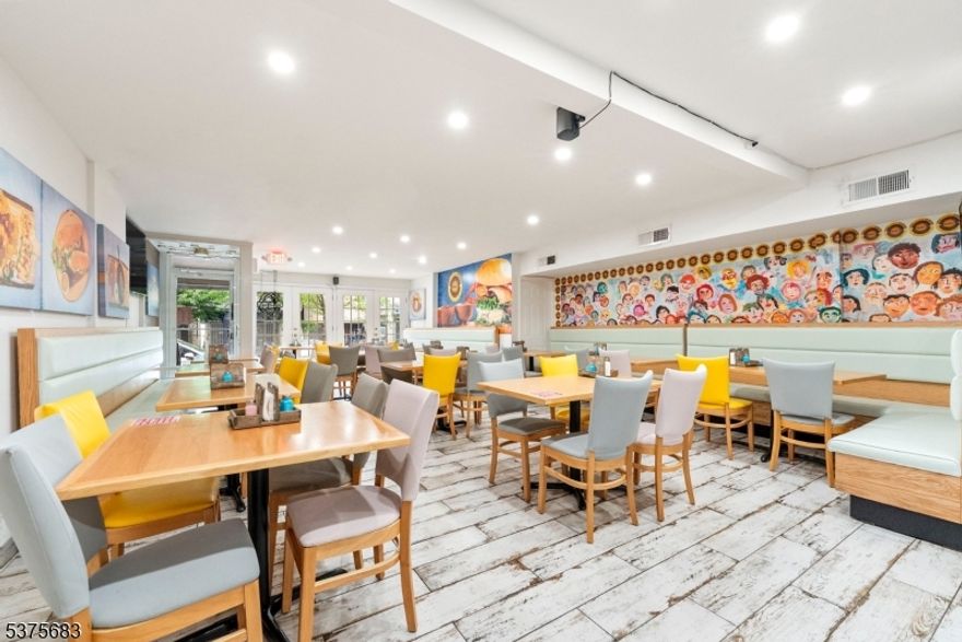 Seize this rare opportunity to own a fully operational, income-generating mixed-use property in the heart of vibrant Elizabeth Ave, one of Elizabeth, NJ's most desirable and bustling locations. This sale includes both the real estate and a thriving restaurant business with strong annual profits, offering an ideal investment for entrepreneurs and investors alike. Restaurant - Fully renovated in 2022, this turnkey restaurant comes complete with all equipment, machinery, furniture, fixtures, menu, and goodwill. The business is in full operation and it has been in operations for twenty plus years, generating impressive annual profits. The basement includes a dedicated office space and a full bathroom for restaurant use. Financials are available to serious buyers upon request. Residential Unit - A spacious three-bedroom apartment featuring one full bathroom, an eat-in kitchen, and a comfortable living room, perfect for rental income. Currently on a 1 year lease at $2,800 per month. Situated in the heart of Elizabeth Ave, a high-traffic area known for its vibrant community, diverse businesses, and strong foot traffic, ensuring excellent visibility and accessibility for the restaurant. Don't miss your chance to own a profitable restaurant and income-producing property in one of Elizabeth's most dynamic areas.