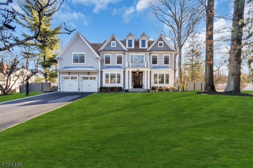 Welcome to this exquisite, BETTER THAN NEW 7 bedroom, 5 full, 1 half bath Center Hall Colonial located in one of Chatham's most sought after locations. Custom built in 2017, this home boasts a welcoming open foyer, 9ft ceilings on 1st & 2nd floors, gleaming H/W floors throughout, a custom designed kitchen w/ large center island & separate eat-in area. The stunning chef's kitchen which is set just off the oversized garage & mudroom with custom built-in cubbies, flows seamlessly into the spacious FR w/gas fireplace. Sliding doors conveniently located just off the kitch and FR lead to a beautiful, large patio & private, level fenced yard.Other features of the 1st level are a formal DR with tray ceiling, a private LR area & a sun-filled bedroom/home office with private full bath. On the second level you will find a stunning Primary Suite complete with a spa-like bath w/soaking tub,a large walk-in shower,custom vanity w/2 sinks, a separate toilet room & 3 spacious walk-in closets. Completing this lvl are 4 addtnl spacious bedrooms w/ custom closets, 2 more large bathrooms & custom laundry room. The LL boasts a huge recreation space, another bedroom & full bath, & an abundance of storage.This one-of-a-kind home complete w/full house generator is PERFECT for entertaining & is located proximate to all Chatham top-rated schools, town & mid-town direct train ! Not to be missed!!