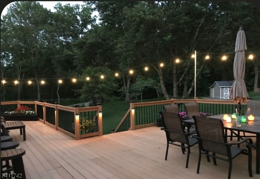 Welcome to 521 Cokesbury Rd, Annandale, NJ where outdoor adventure, small-town charm, and everyday convenience come together seamlessly. Tucked away with a long private driveway and expansive yard, this 4-bedroom, 2.5-bath home offers both privacy and functionality. Major systems including the septic system, HVAC, and water heater were all replaced approximately three years ago, offering peace of mind for years to come. Set on over 2 acres, the property features numerous updates and improvements throughout. The private backyard is ideal for relaxing or entertaining, highlighted by an elevated deck, hot tub, outdoor shower, firepit, and a large storage shed. Outdoor enthusiasts will love that the scenic Columbia Trail borders the property, providing direct access to miles of trails right from your backyard. Enjoy quick trips to downtown High Bridge, known for its welcoming community and local favorites. Voorhees State Park is nearby, offering hiking trails, open fields, and sweeping views. Water lovers will enjoy just a short drive to Spruce Run Recreation Area and Round Valley Reservoir, while downtown Clinton is only 10 minutes away for additional dining and shopping. Located within the Clinton Township School District and served by North Hunterdon High School, this home perfectly blends nature, thoughtful updates, and community offering an exceptional Hunterdon County lifestyle.