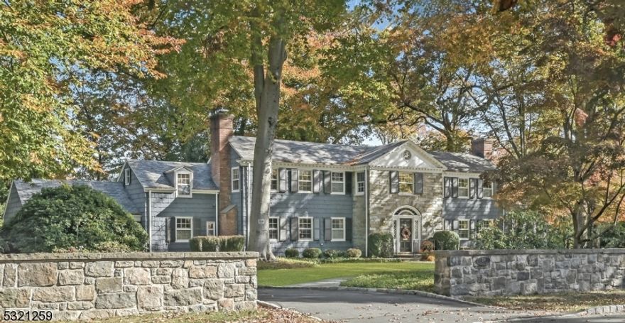 Welcome to 219 Woodland Road. A classic Georgian center hall colonial on just under 1 acre in the highly desired Hill section of Madison. Less than a mile from downtown and the train station, this exquisite home offers unparalleled charm and sophistication. Modernized with entertaining in mind, the first floor features an expansive living room w/ wood burning fireplace. Adjacent is a seasonal screened porch. A bright family room looks out to the slate patio & private yard. The large dining room opens to a joyful conservatory full of natural light. The impeccable chef's kitchen is an entertainer's delight with double ovens, double dishwashers, large center island, oversized garden window, and a second stairwell to the upper level. A wood paneled library w/ fireplace, au pair suite, and tastefully appointed powder room complete the main level. The second level features 4 large bedrooms, each with direct access to a bathroom. The primary bedroom is a relaxing retreat with a vaulted ceiling, views to the private yard, adjoining en-suite w/ soaking tub, large shower, double vanity, water closet, and sauna. This diamond is complete with a partially finished basement, laundry room, storage rooms, garage, walk-in cedar closet, and an abundance of architectural features and details.