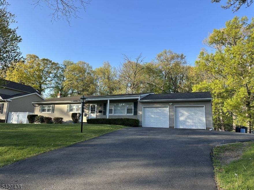 Charming 3 Bedroom, 2 Bathroom, Ranch with spacious yard and extra driveway parking! This beautiful, well maintained home offers 3 bedrooms, 2 full bathrooms, and the perfect blend of comfort and convenience. Easy one floor living, spacious primary bedroom and bathroom with a partially finished basement to boot. Pull down attic provides extra storage space! Located just minutes from major highways, bus, and train stations, commuting is a breeze. Spacious rooms with plenty of natural light. Large backyard with newer stone patio perfect for outdoor gatherings, or relaxation. Large shed in rear yard for extra storage. Large driveway & oversized two-car garage. This home provides the ideal blend of suburban tranquility and urban accessibility. Don't miss the opportunity to make this your forever home!