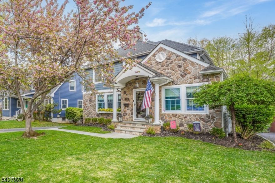STORYBOOK CURB APPEAL MEETS UPDATED INTERIORS IN ONE OF CHATHAM'S BEST NEIGHBORHOODS! Thoughtfully renovated, offering built-in cabinetry, hardwood flooring, high-end finishes, stylish light fixtures & large Windows at every turn. First floor is both open concept & cozy in layout designed for modern living. Upscale & expansive Chef's Kitchen is heart of home w/ plentiful natural light, sprawling Center Island w/ lots of seating, bev fridge & under-counter microwave, Thermador 6-burner stove, white/dark wood cabinetry, easy access to Deck/lovely Back yard. Open to Family Room w/ stunning reclaimed wood fireplace surround & large Windows. Dining Room has 5 Windows, window seat w/ Storage Drawers. Flows into sun-filled Living Room offering custom built-in shelving/cabinetry flanking desk, gas fireplace w/ weathered brick surround. Primary Suite exceeds expectation w/ vaulted ceiling, dressing area, Walk-In Closet w/ custom drawers/shelving.  En-Suite Bath has large frameless glass door Shower w/ multiple showerheads, double vanity & classic finishes. 2 other Bedrooms w/ excellent Closet Space share lovely Full Hall Bath w/ double sinks, tub/shower w/ tile surround. Lower Level offers large Recreation Room, Full Bath w/ Shower, Utility Room. Great Storage. Instahot Water Heater. Detached 2-Car Garage. Highly coveted neighborhood known for trick-or-treating & turkey trot. Blocks to town, NYC train, top-tier Chatham schools including Milton, & Kelly's Pond. 114 Coleman has it all!