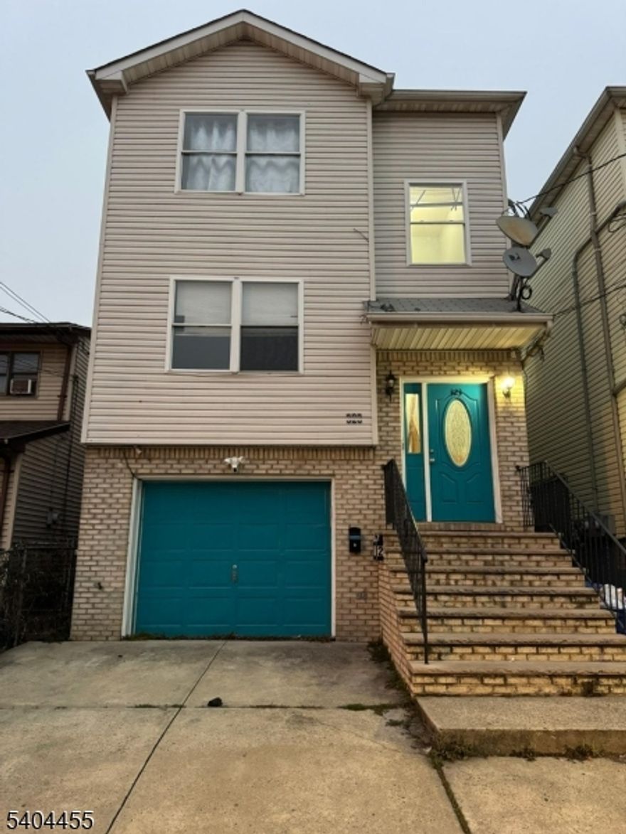 Beautiful 2003-built 2-family home offering modern space, comfort, and versatility! The second-floor unit features 3 spacious bedrooms and 2 full baths, including a primary suite, bright living room, dining area, and well-kept kitchen. The first-floor unit also offers 3 bedrooms and 3 full baths, providing incredible flexibility for extended living or strong rental income potential. A large finished bonus room on the ground level, located behind the garage, adds even more usable living space?perfect for recreation, home office, gym, or additional storage. This home has been very well maintained with pride of ownership throughout, offering great layout, generous room sizes, ample closets, and an overall solid construction feel. Conveniently located near shopping, transportation, and local amenities, this is a fantastic opportunity for owner-occupants or investors seeking a move-in-ready property with excellent income potential. Don?t miss it!