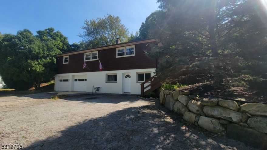 YOUR SEARCH IS OVER!  Bright and light home with a wonderful backyard is waiting for you!  First floor features large living room, kitchen open to dining room, primary bedroom with walk-in closet offering built ins and a full large bath, two additional spacious bedrooms, main bath, and a laundry. Lower level offers family room, kitchenette, bedroom, and a bathroom..  Mother-daughter set up.  You will be impressed with your private yard with a spacious deck, grill, shed for your use, part of it is fenced in.  Tenants responsible for all utilities, lawn maintenance, snow removal of the driveway. Owners use garages and storage room.   Good credit, income verification, application, NTN, tenant insurance are required.  Come and see for yourself!