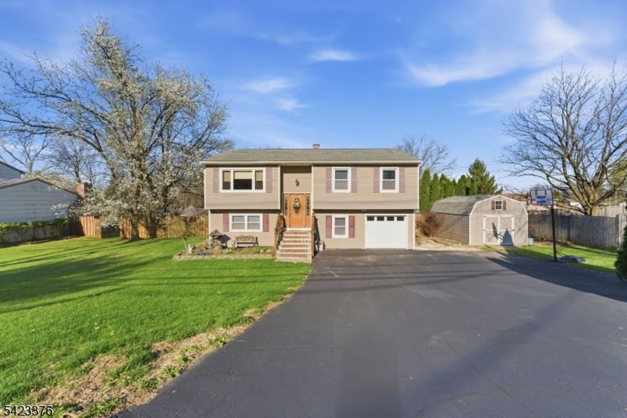 Welcome to this bi-level home located in the desirable Brakeley Park section of Lopatcong, NJ! This home offers great bones and endless potential, featuring a large driveway with a nice setback on a spacious lot. Enjoy outdoor living with an above ground pool, wooden fence, huge shed, and a deck off the dining room with stairs leading down to a patio and playground area perfect for enjoyment. As you enter, you'll appreciate the bi-level design. The upper level features a bright living room, kitchen, and dining room combination, along with three bedrooms and one full bathroom on the same level. Downstairs is where the home truly shines, offering a cozy den, one bedroom, and an office space with a convenient half bathroom and a door leading directly to the backyard.  Commuters will love the easy access to Routes 78, 22, and 80, and you're just minutes from Easton Pa, How can I forget Lopatcong Park, middle school, elementary school and high school all close by.  With low property taxes and plenty of space inside and out, this home presents a fantastic opportunity to make it your own.