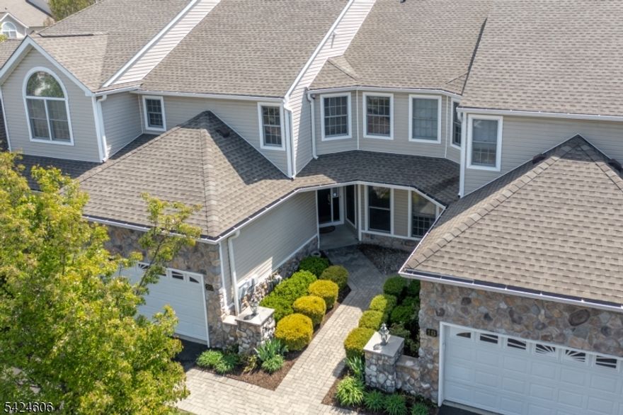 Welcome to a one-of-a-kind Riviera model townhome in the prestigious The Fairways at Livingston, where luxury, comfort, and lifestyle come together seamlessly. This beautiful 3BR, 3.5B and 2 car-garage home showcases custom wood flooring, designer lighting, elegant interiors, and custom blinds throughout. The freshly painted first floor offers an inviting layout featuring a private den, formal dining room, spacious living room with a cozy gas fireplace, powder room, and a well-appointed kitchen with granite countertops. A convenient first-floor laundry room completes the level. Upstairs, unwind in your luxurious primary suite with a sitting area, 2 walk-in closets, and spa-like bath featuring a jetted soaking tub. Two additional generously sized bedrooms and a full bath provide comfort and flexibility for guests. The fully finished basement is a standout, offering granite flooring, a recreation area, gym/flex room, and a full bathroom, perfect for entertaining, working out, or extended stays. Step outside to your private deck overlooking a quiet backyard setting, ideal for relaxing or hosting. .Living in The Fairways means enjoying a gated, maintenance-free lifestyle with premium amenities designed for everyday luxury: Swimming pool, Elegant clubhouse, Fitness center / gym, Tennis, Pickleball & Basketball courts. Beautiful walking paths & manicured grounds. All of this is set right next to the Cedar Hill Golf & Country Club, enhancing the community's upscale feel.