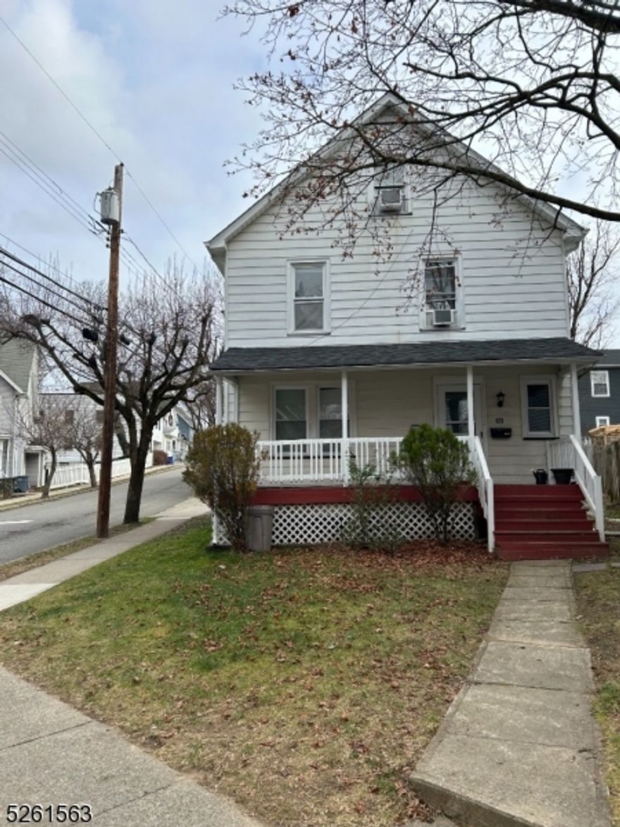 Freshly painted and newly renovated this home shows very well and close to town and schools. Wonderful great room for entertaining.  Keybox on front door, this home comes with 2 parking spaces in driveway. when looking at home first row on right next to home is down stairs tenant, next row is upstairs tenant. Laundry room in basement.