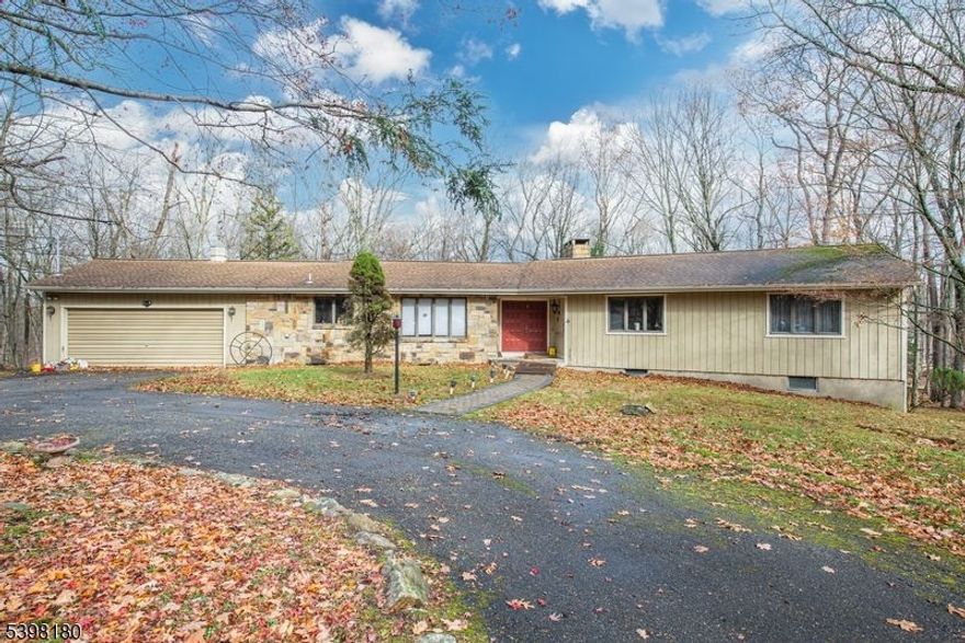 Incredible opportunity to own a sprawling 4 bedroom ranch home in Long Valley, with a full, finished, walk out, daylight basement with fireplace/insert, a very large 2 car garage, tremendous newer deck, custom built home, privacy, a beautiful living room also with a fireplace, custom skylight and sliding glass doors to the deck and the lovely rear park like property. This home has central air conditioning! Enjoy Blue Ribbon Schools!