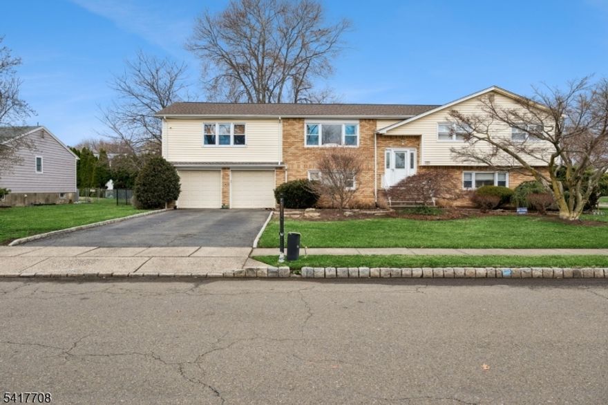 This spacious bi-level 5BR/2Baths with in-law suite on a large corner lot! This home offers a versatile layout perfect for extended living space. The main level features a bright living room, formal dining room, and a large kitchen, along with three generously sized bedrooms and a full bath. A huge family room provides the perfect space for entertaining, with direct access to a deck overlooking the property. The lower level is set up as a complete in-law suite, offering two bedrooms, a full kitchen, living room, and dining area ideal for extended guest accommodations. This level also includes access to a covered patio through sliding doors, creating additional outdoor living space, as well as a convenient entrance from the garage. Additional highlights include a 2-car oversized garage, ample storage, and flexible living options throughout. Whether you're looking for space to grow or a home that can accommodate extended guest, this property delivers comfort and functionality both inside and out.