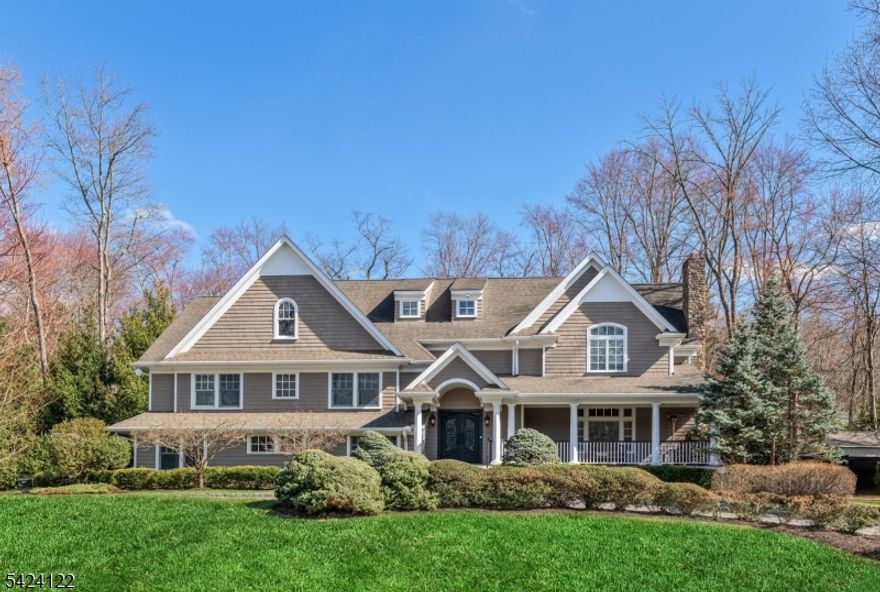 Magnificent custom built 6000 sq ft Colonial on a flat acre at the end of a rare double cul de sac in one of the most coveted Ho Ho Kus neighborhoods. This 5 bedroom 5.5 bath residence is designed for todays lifestyle offering scale privacy and sophistication rarely available in town. The main level features a gracious foyer powder room living room with bar and fireplace banquet dining room and an expansive gourmet eat in kitchen with large island walk in pantry and top tier appliances all with an effortless flow for hosting. A first floor wing with its own playroom or guest bedroom full bath den mudroom wet bar direct access from the oversized three car garage and an expansive great room with soaring vaulted ceilings and fireplace creates an ideal setup for flexible living spaces. Upstairs a generous primary suite offers a tray ceiling bedroom a separate library dedicated home office and two walk in closets with spa bath. Three additional ensuite bedrooms feature excellent closet space including two with walk in closets plus a convenient laundry room. The finished lower level provides flexible recreation space gym and full bath. Outside a newly fenced resort like backyard showcases a free form Gunite pool expansive patio and lawn perfect for summer gatherings. This is a rare opportunity to enjoy a move in ready home in Ho Ho Kus offering top rated schools a vibrant downtown and convenient NYC transportation.