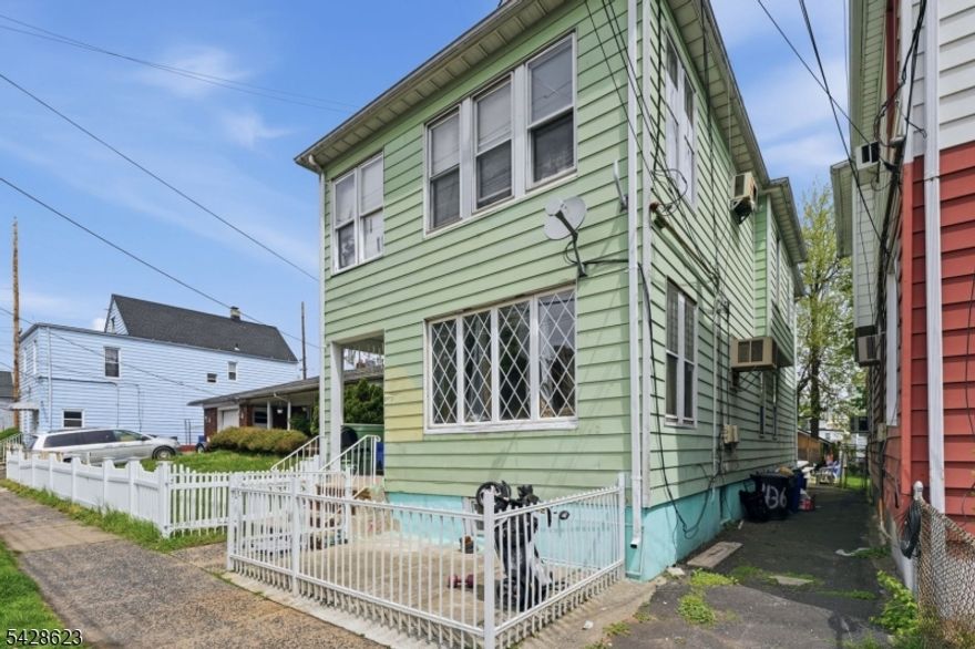 Calling all investors, This is the value-add opportunity you've been waiting for. Unlock the full potential of this income-producing 2-family fixer-upper, delivered completely vacant and ready for your vision. The first floor features  2-bedrooms, 1 full bathroom layout with a formal living room, dining room and a front porch offering additional flexible space. The second unit spans the upper level and finished attic, offering 3 bedrooms and 2 full bathrooms, along with its own formal living and dining areas and an additional front porch for extended living. The property also includes a finished walkout basement with a recreation room, full bathroom, and two separate walkouts ideal for added functionality or future income possibilities . Conveniently located near public transportation, restaurants, schools, and shopping, this property offers strong upside potential for renovation and long-term returns. A rare opportunity to customize, add value, and maximize cash flow in a high-demand area. Sold Strictly As Is.