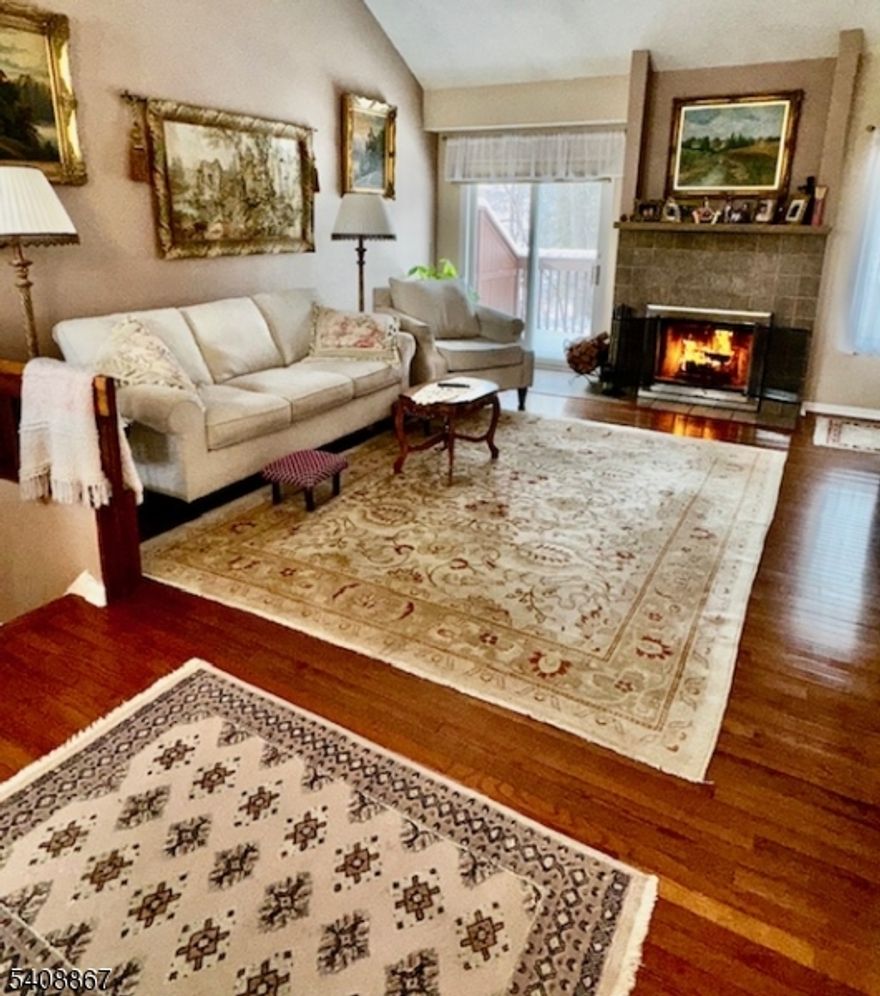 Totally Updated with Quality Workmanship. 2 Beds,2 Full Baths. Gorgeous Wood Floors. Kitchen with Granite, Tile Backsplash, Custom Ceiling, Appliances & Pantry. Living Room with Cathedral Ceiling, Wood Burning Fireplace, Sliders to Deck. Primary Bedroom has Beautiful Tile Work & Walk in Closet with Organizer. Washer/Dryer Unit Included on Main Level. 2nd Floor has Bedroom with Custom Closet Storage, Full Bath and Utility Closet. Community Pool, Small Playground, Tennis & Clubhouse Courts. Water & Sewer Included in Monthly Dues.