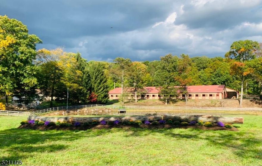 Now available for your consideration Hidden Acres Farm! Superb equestrian facility designed by an internationally recognized trainer where the utmost needs of horse & rider are met. Brilliantly set on 10+ acres, this facility is located 35 miles from Manhattan & located between I-80 & I-287. A state-of-the-art barn offers 28 European-style matted box stalls designed w/ 2 wings flanking a vast 12,000 sf  indoor riding arena w/ GGT high-performance footing, LED lighting, fly misting system & free-span trusses. Year-round functionality w/ the heated viewing lounge, 3 bay grooming/wash stall area, laundry/feed rm, tack room with custom lockers and bathroom. The 240' x 140' outdoor arena is a rider's dream and one of the East Coast's few Derby Banks. There are 14 individual paddocks equipped w/ heated waterers. A 3 BR, 2 BA primary home w/ versatile private office + two 1-bedrm apartments occupying the lower level. Addt'l staff housing incl: 1 BR apt above barn + 3 BR grooms' accommodations. This property has been successfully rented at $20K monthly making it an ideal investment for the buyer to use/rent the facility in totality or partially for their own needs! West Milford is known for its equestrian activities; top veterinarians & farriers, along w/ some of the best training facilities, horse shows, & trail riding in the area, including neighboring Bubbling Springs, a 40 acre park. This is a unique opportunity to own a facility that can accommodate all equestrian disciplines!