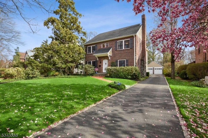 Renovated Brickfront Colonial beauty nestled on a generous half-acre lot along one of Summit's oldest streets just a sidewalk stroll to vibrant downtown Summit. A charming vestibule welcomes you into an inviting formal living w/gas FP and a spacious dining room perfect for entertaining. The updated EIK features SS appliances, large movable center island with breakfast bar and large pantry which opens seamlessly to a sun-filled family room w/ coffered ceiling & southern exposure, overlooking a private patio & backyard. A detached two-car garage enters through a convenient mudroom. A tucked-away first floor office with attractive French doors and a powder room complete the main level. Upstairs are 4BRs, a beautifully renovated marble hall bath with laundry, and a 2nd office ideal for work or study. The luxurious Primary Suite includes a custom WIC, an add'l double closet & French doors leading to Juliette balcony. The Primary Bath is appointed with a Restoration Hardware vanity, Rohl fixtures, air-jetted tub, & separate shower stall. The finished Lower Level offers a Rec Room w/ direct backyard access, flex space for exercise or hobbies, utility area & abundant storage. Outdoor living is a true delight w/ a spacious rear patio perfect for relaxing. A tucked away fire pit takes advantage of this home's 350-foot-deep backyard oasis. Front landscape lighting adds evening curb appeal. Truly a special home and property! FP/chimney/flues to be purchased in as is condition.