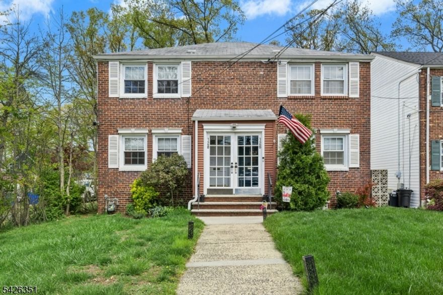 Wow! Welcome home to this spectacular and fully renovated 2-bedroom half duplex in the heart of Cranford just blocks to schools, vibrant downtown, and the train for an easy NYC commute! This sun-filled home features an oversized living room and a stunning designer kitchen with navy custom cabinetry, quartz countertops, high-end appliances, gold accents, and a custom butcher block table for added style and function. A rare and spacious family room addition overlooks the expansive, fenced-in backyard with patio perfect for relaxing or entertaining. Upstairs offers two generously sized bedrooms, including a primary large enough for a king bed with a fantastic walk-in closet, and a magazine-worthy full bath with custom tile and beautiful finishes. The large basement provides abundant storage, laundry, and a bonus bathroom with potential to finish for additional living space. With no HOA fees, low taxes, two off-street parking spaces, plus family room addition and an oversized private yard rarely found in similar Cranford properties, this home truly stands out. Move right in and enjoy the best of Cranford living!
