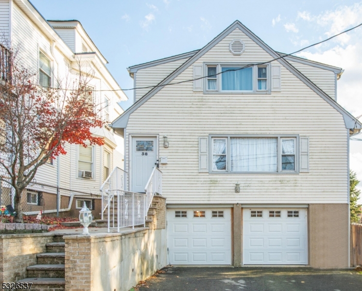 Welcome to this versatile and spacious 2-family home in the heart of Prospect Park! Perfect for homeowners and investors alike, this property offers incredible living space and functionality. The first-floor unit boasts a large eat-in kitchen with granite countertops, seamlessly flowing into a cozy living room. It features the primary bedroom with its own private bath, 2 more bedrooms and a shared full bath, plus a partially finished basement with an additional bedroom, full bath, dual laundry, and a summer kitchen with a walkout to the backyard ideal for entertaining. The second-floor unit includes 2 bedrooms, an office/nursery, an eat-in kitchen, and a spacious living room, offering flexibility for any lifestyle. Additional highlights include a newer roof and windows, hardwood floors, separate gas and electric utilities, natural gas hook up for outside grill, and a workshop area in the walkout lower level. The oversized 2-car garage and driveway provides ample storage and parking plus there is additional off street parking. Conveniently located near schools, shopping, and public transportation, this home is a must-see. Don't miss this exceptional opportunity!!