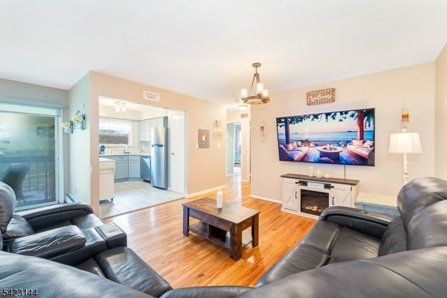 Welcome to this beautifully updated 2-bedroom, 1.5-bath condo in the sought-after Alexandria subdivision in Hillsborough, where style, comfort, and easy living come together effortlessly. Filled with natural light and a fresh, airy feel perfect for the season, this home invites you in from the moment you step through the door. The kitchen has been thoughtfully renovated with today's trends in mind, featuring sleek finishes, modern cabinetry, and a clean, polished aesthetic that makes both everyday living and entertaining a breeze. The bathrooms echo that same elevated style with contemporary updates that feel both fresh and timeless. Gleaming hardwood floors flow throughout the home, adding warmth and sophistication while enhancing the bright, open feel of the space. Step outside to your own private deck, the perfect spot to enjoy morning coffee, unwind in the evening, or simply take in the fresh spring air, an ideal extension of your living space. Enjoy the convenience of in-unit laundry and the peace of mind that comes with low-maintenance living HOA fees cover heat, water, sewer, and access to community amenities. A turnkey opportunity offering style, simplicity, and the kind of everyday comfort that makes you feel right at home.