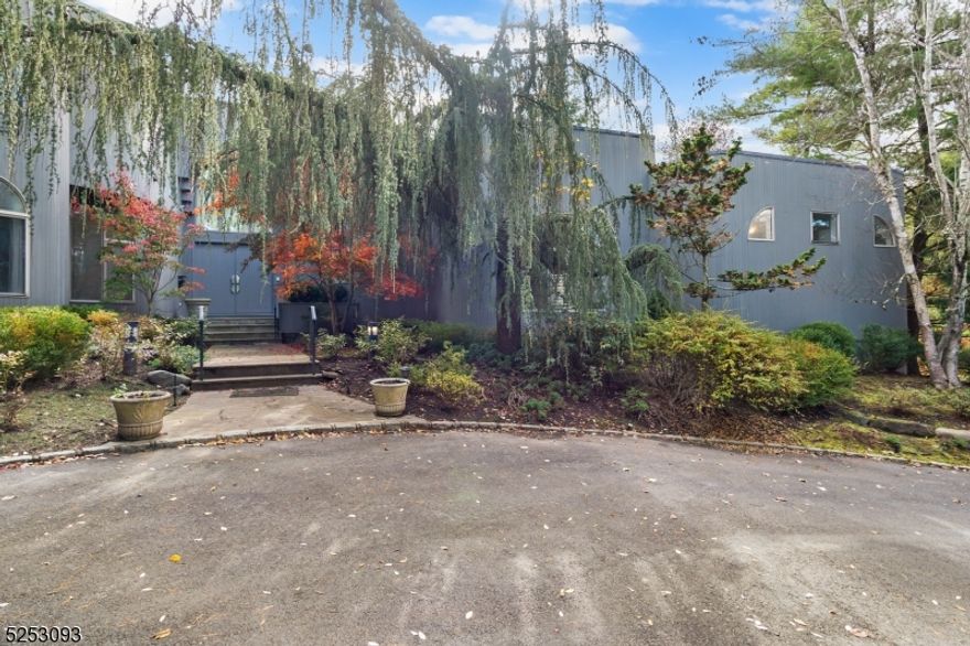 Lovingly maintained 5 Bedroom, 4 Bath, 2 Half Bath home with 8,700 +/- sf of finished living space on 3 floors. This classic Chestnut Hill expanded contemporary is tucked away on a private .92 acre  quiet cul-de-sac lot with serene, beautifully landscaped backyard oasis. The spacious screened in porch overlooks an in-ground heated pool w convenient electric cover. Enter into the enormous 2 story foyer with marble floors, custom amenities & decorative details. The 1st floor is home to 3 Bedrooms, Powder room, formal sunken Living Room w fireplace & wet bar. Enter the elegant Dining Room w crystal chandelier through stunning etched glass panels. The gourmet Kitchen w 2-tier center island cook top, Jenn air bbq grill, dual dishwashers ,Sub-Zero 60" refrigerator/freezer and skylight has direct access to the spacious Family Room w custom built-ins. The luxurious Primary Suite includes master Bath w skylight, spa-like jetted tub, 2 commodes, steam shower & 2 walk-in closets. A large sitting room/office with decorator details adjoins the Primary suite. The 2nd ensuite Bedroom houses a walk-in closet & spacious Bath w shower & tub. A third Bedroom w adjoining full Bath & Laundry room w pantry lead to a cabinet lined 4-car garage. The 2nd Floor is home to 2 generous Bedrooms w walk-in closets & full Bath. Full Basement has huge Rec Room, sauna, golf driving range, work out area & half Bathroom. Whole house generator.