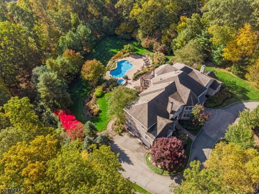 Custom Built Smoke Rise residence, hits the market for the first time ever! Built in 2006 and only 30 miles from NYC, this state of the art 10,000 sqft. masterpiece boasts an impressive 30 rooms. With a total of 5 Bedrooms plus 2 bonus rooms and 6.5 bathrooms that offer versatility for all your unique needs including a potential in-law suite or separate caregiver space.This home exudes warmth and elegance with four fireplaces, three of which are gas and one wood-burning. Impressively High ceilings with massive floor-to-ceiling windows infuse every corner of the home with an abundance of natural light. The open and airy design ensures that every room is bathed in sunlight, creating a welcoming and refreshing atmosphere.