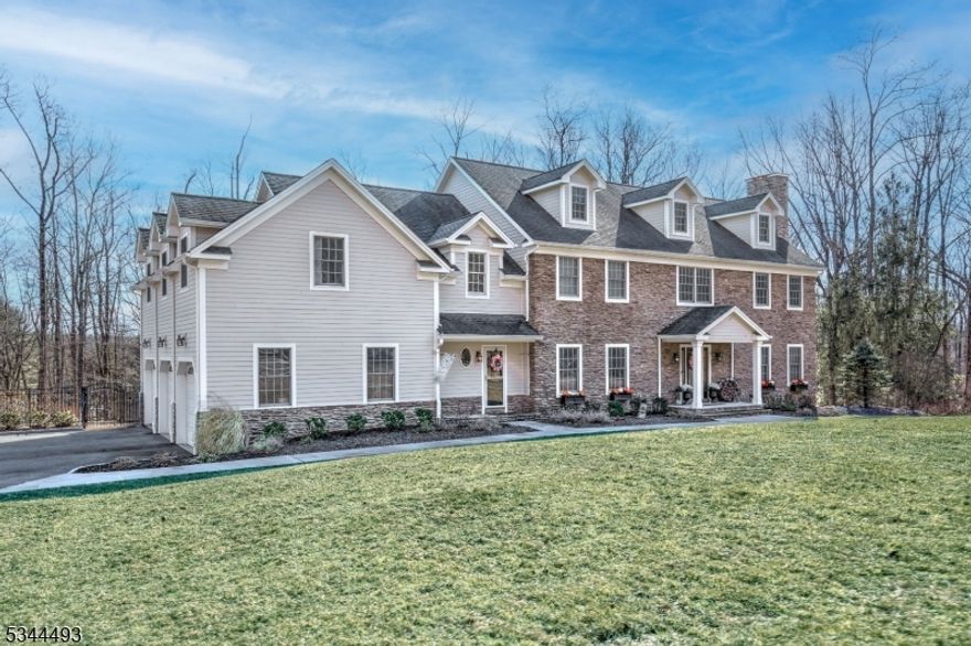 "Attractive assumable mortgage for qualifying credit, takes 3-6 months to process." Private 6-acre setting is 1.3 miles from the main crossroads in quaint Mendham Village. Built in 2005 with 4 floors of living space has been renovated & improved since present owner bought in 2009 is in Move-in condition. Gorgeous Gunite, heated pool, & stand-alone Hot Tub by walkout basement for Summer and Winter enjoyment. The basement has been beautifully finished with kitchenette, full bath, second Washer & Dryer, recreation room, exercise area, wine room and still ample unfinished storage areas. The kitchen boasts custom cabinetry with quartz and leathered granite countertops as well as a double Subzero refrigerator, Wolf range and Marvel wine fridge. Mudroom with gorgeous millwork, & easy access to side door, garage and back stairs to second floor. The family room offers a dual fireplace (gas/wood) & a custom Coffee/Wet Bar. The Primary bedroom boasts double-sided gas fireplace, 3 walk-in closets, beautifully renovated bathroom with dual sinks, soaking tub, oversized stall shower with multiple shower heads. There are 5 bedrooms on the 2nd floor, 3 of which are ensuite and the other two share a full bathroom. The 3rd floor is very large and can easily be converted into a sixth bedroom. Updated bathrooms and powder room. Generac house generator installed in 2020, as well as 2 air conditioners, a furnace & hot water heater in the last few years. SF from tax records doesn't include basement.