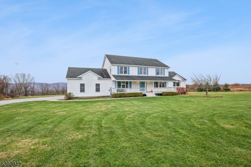 Welcome Home! This beautiful colonial sits on just under 3 acres, offering 4 bedrooms and 2.5 baths with incredible space, comfort, and scenic views. Built with 2x6 modular construction, this home provides excellent insulation and impressively low utility costs.The main level features an open floor plan with hardwood floors, a bright kitchen with huge counter space, double ovens, and ample cabinetry, flowing into the dining room and newly finished great room with high ceilings, custom built-ins, vinyl plank flooring, and an electric fireplace. Additional rooms include a family room, office, and a spacious laundry/mud room with two closets and storage.Upstairs, the primary suite offers a walk-in closet, jacuzzi tub, oversized shower, and double vanity. Three additional bedrooms complete the level, with all hardwood flooring.The walk-out basement features a custom bar, surround sound, large storage room, and an additional framed room and bathroom already prepped for finishing.Outdoor living shines with a large back deck, lower patio, 30x35 garden, fish pond, big open yard with a sledding hill and playhouse, plus spectacular sunrises, sunsets, and night sky views.Extras include fully paid-off solar panels (rear roof), baseboard heating, an oversized 2-car garage, recently cleaned septic, and a serviced furnace.Minutes to High Point State Park, downtown Sussex, parks, hiking, and easy access to NY & PA.