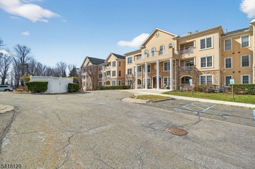 2nd Floor Dorchester located in the Active over 55 Community of Fox Hills.  Fox Hills is designed to offer comfort, convenience, and a range of amenities for residents aged 55 and over. This 24-hour gated community provides a dedicated shuttle service, making it easy to access nearby shopping, dining, and major highways. Each building and the clubhouse offer Elevators.  The community has a full calendar of social events and activities. Residents enjoy a spacious 26,000-square-foot Clubhouse  and a broad selection of indoor and outdoor amenities. These include indoor and outdoor pools, hot tubs, steam rooms, saunas, card rooms and a fitness center. Outdoor recreation options feature tennis courts, bocce, shuffleboard, and a gazebo. There is a greenhouse and fifty garden plots available to cultivate flowers and plants.The unit offers a underground parking spot with an adjoining storage area.  Residents can enter the secure building from the front entrance or from the parking garage on the lower level. This model is situated in the friendly Wilson Building on the 2nd floor. It has recently been painted and deep cleaned for a fresh start. The unit includes 2 bedrooms, 2 full bathrooms, and a den that can be used flexibly. Open concept kitchen, dining, and living room, with plenty of light from sliding door leading to a privately screened balcony facing the back of the building, offering privacy and forest views. This outdoor area is perfect for relaxing or nature watching.