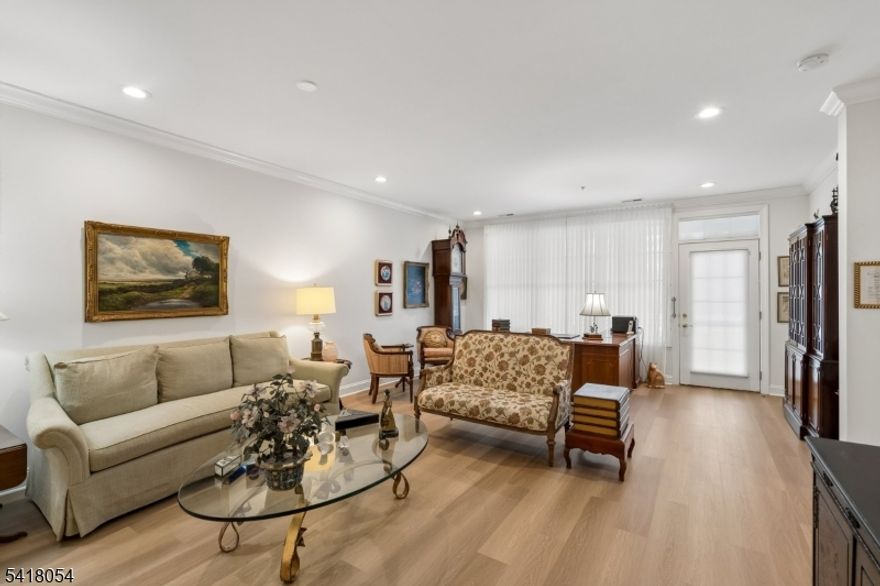 Welcome to The Pointe in Livingston, a vibrant 55+ community offering comfort, style, and ease of living! This bright and spacious Dakota unit (built in 2007) features 2 bedrooms, 2.1 baths, 9-ft ceilings, and two private patios/balconies, perfect for al fresco dining. The primary bedroom has 2 walk in closets and en suite with stall shower, tub, and double sink vanity. Enjoy a beautifully appointed kitchen with granite countertops, two ovens, dishwasher, custom blinds, and in-unit washer/dryer. Additional highlights include waterproof, slip-resistant flooring, assigned parking, and extra storage. Residents enjoy exceptional amenities including a clubhouse, pool, gym, and movie theater?creating a fun, welcoming lifestyle. Easy, low-maintenance living at its finest!