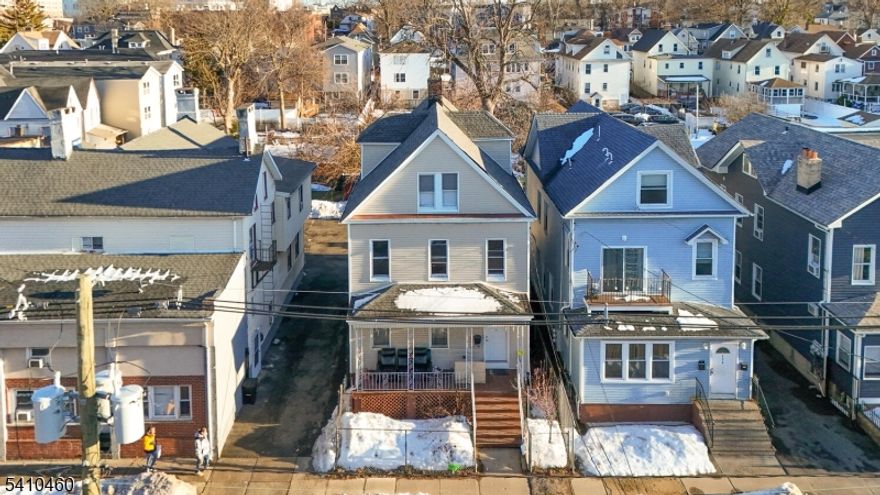 Exceptional income-producing investment opportunity in Elizabeth's thriving Midtown/Elmora section. This well-maintained 3-unit property offers strong rental demand and consistent income potential, making it ideal for investors or owner-occupants. Each unit includes one dedicated parking space, modern kitchens and bathrooms, and spacious layouts. The property also features extra bonus space in the fully finished basement with its own private access, offering flexible use for storage or additional gathering space. All units are income-producing with reliable, long-term month-to-month tenants and a strong history of on-time rent payments. Perfect for an owner-occupant to live in one unit while renting the others to help offset the mortgage. Conveniently located near Kean University, NJ Transit, major highways, Newark Airport, and the Port of Elizabeth. This is a prime opportunity that will not last!