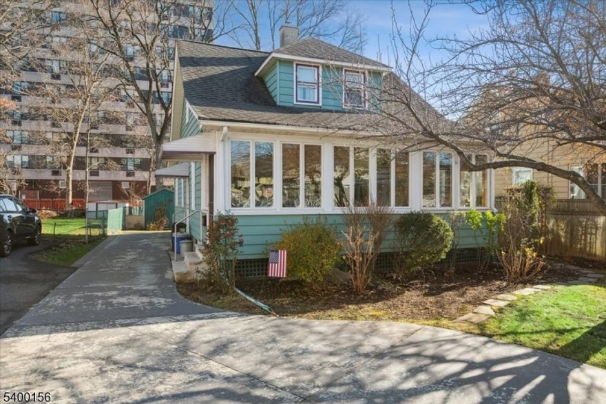 Charming & well-maintained Cape Cod located minutes from town.  An inviting enclosed front porch welcomes you with abundant natural light, complemented by a cozy sunroom for year-round enjoyment.  Beautiful hardwood floors run throughout, adding warmth and character to the home.  This 2BD 2BA features and open-concept living and dining area-perfect for entertaining, flowing seamlessly into the kitchen.  First floor bedroom offers flexibility, while the spacious primary suite upstairs include a walk-in closet and private full bath.  Full unfinished dry basement, updated Cutler-Hammer 200-amp electric, Hot water heater 2019, New windows throughout, including some Anderson, Central A/C 4yrs old, Nice backyard with storage shed.  Shared entry for driveway.  Close to Highways, Transportation, Shopping, Restaurant, and Bridgewater Commons Mall.  This home combines comfort, charm and convenience. Great starter home. Minutes from downtown Somerville.  Don't miss out on this one.