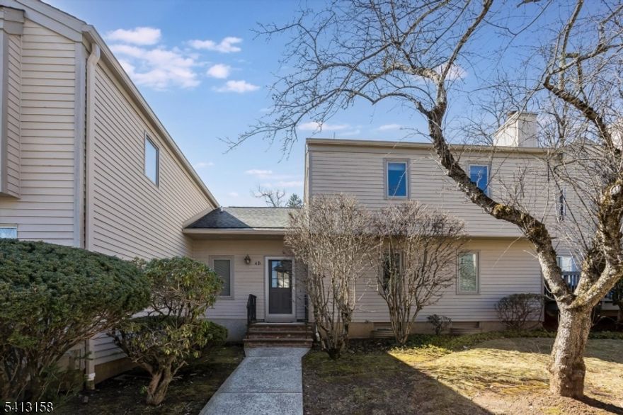 Welcome to this beautifully maintained 2-bedroom, 2.5 bath townhouse, ideally located just moments from the heart of Bernardsville. It is in close proximity to local shops, grocery stores, the public library, restaurants, and public transportation for easy commuting. Inside, you'll find a bright and inviting open floor plan featuring a kitchen, a spacious living room adorned by a fireplace, and a dining room that opens to a private patio.  There is also a convenient powder room on the main level. Upstairs are two spacious bedrooms and two full baths, including a well-appointed primary suite. There is a large unfinished basement that holds the laundry and storage area, which the new owners can finish, and an attached one-car garage. Enjoy low-maintenance townhouse living in a prime location. The TV in the living room is included.