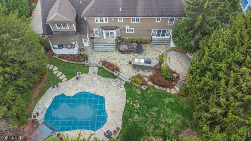 This Home checks every box & then raises the standard!Nestled in one of North Caldwell's most sought-after enclaves,this home offers the kind of privacy,scale & setting that rarely come together so seamlessly.A timeless cedar & brick exterior sets the tone,professional landscaping & meticulously maintained grounds.Inside,the home showcases high-end finishes & attention to detail.Highlights include a dramatic 2 story foyer,LivRm w/coffered ceiling,DinRm w/wainscoting & FamRm w/gas fireplace.A true Chef's kitchen w/custom cabinetry & premium appliance package featuring a Wolf range,Sub-Zero fridge & Miele dishwasher for the ultimate culinary experience!The luxurious primary suite is highlighted w/tray ceilings,spa-like bath w/radiant heated floors & an incredible walk-in closet w/brick accent wall!A true retreat designed for comfort & finished w/intention. Meticulously maintained + thoughtfully upgraded,this exceptional home is a blend of luxury,comfort & modern convenience.Designed for elevated everyday living & effortless entertaining,the property features a resort-style backyard complete w/an app-controlled pool,outdoor fireplace & fully equipped outdoor kitchen.With every detail carefully considered & impeccably maintained,this home presents a rare opportunity for turnkey living w/exceptional indoor/outdoor functionality. Located just 19 miles from NYC,this distinguished residence offers an unparalleled living experience for buyers seeking a refined suburban lifestyle!