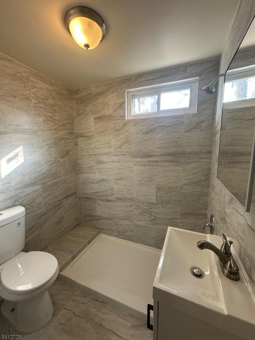 Welcome to this warm four bedroom, one bathroom 1st floor apartment. Enjoy the backyard access  and nine feet ceiling, granite countertops, hardwoord floor and fully tiled bathroom. Bright natural lighting throughout the entire apartment. Owners pays for water, sewer, taxes and general trash removal. Renter is responsible for gas and electric utilities. First month's rent is due at signing. No subleaseing is allowed. Lease duration 1 year. Requirments: Proof of income, No evictions, 1st month's rent, One-month-and-a-half security deposit, and half-a-month of broker's fee.