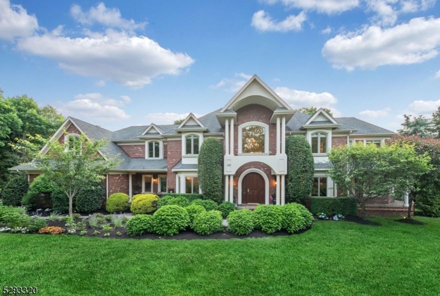 This enticing tree-lined cul-de-sac epitomizes the privacy and exclusivity found at 108 Garden Court. Experience the pinnacle of redefined luxury, a place where classic architecture seamlessly blends with chic, vibrant design. Each room captivates, stirring the senses and evoking a profound sense of peace and tranquility. The impressive all-brick exterior is softened by lavish flowering gardens and specimen trees and is perfectly located near all that Franklin Lakes has to offer! With over 6000 sf, enjoy an open flow throughout the 1st floor. The Great Room with coffered ceiling, fireplace, and glass doors is so inviting! The modern day speakeasy lounge with covered porch is perfect for soirees! The kitchen fits all sized gatherings. The guest suite/home office has walls of windows. 7 beds, 7 baths including a ZEN primary suite with sitting room or quiet home office and cozy fireplace, 5 more 2nd floor bedrooms, open family room, laundry room (plus 2 additional hook up locations) Finished Lower Level and lots of storage! MINT condition!
