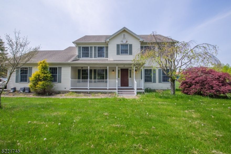 Welcome to this wonderful Center Hall Colonial with charming Front Porch and very large Level/Open Backyard.  This beautiful home features 4 Bedrooms, 2 1/2 baths, finished basement, 2 car attached garage, new roof & furnace plus  public water & public sewer.  The gorgeous recently renovated Kitchen features many custom features such as a large Center Island with seating for 4 and an additional eating area with sliders that lead to deck/hot tub and backyard.  The Kitchen is open to the Family room which offers a fireplace and lots of light.  The 1st floor also offers an Entry Foyer, Formal Living Room & Dining Room, Powder Room, Laundry room and entrance to Garage.  The 2nd level features a large Primary Suite with Full bath (Soaking Tub/separate shower), double sinks and walk-in closet. There are 3 additional bedrooms and Main Bath on this level.  The Lower Level has a large Rec Room & Utility room.  Photos are from previous llisting